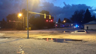 So Many Stones Fell in Last Night's Freak Hail Storm, They Flooded This Denver Intersection
